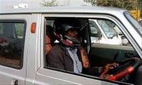 See this UP Police charged a man for not wearing Helmet driving a Car